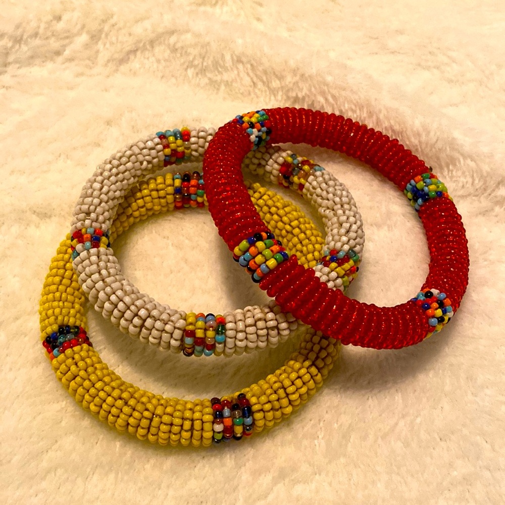 African print Handmade pearl bracelets set of three . Red , yellow, white.